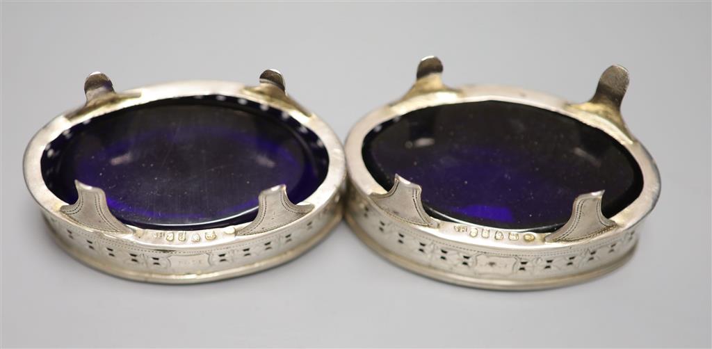 A pair of George III pierced silver navette shaped salts, Soloman Hougham, London, 1797, 89mm.